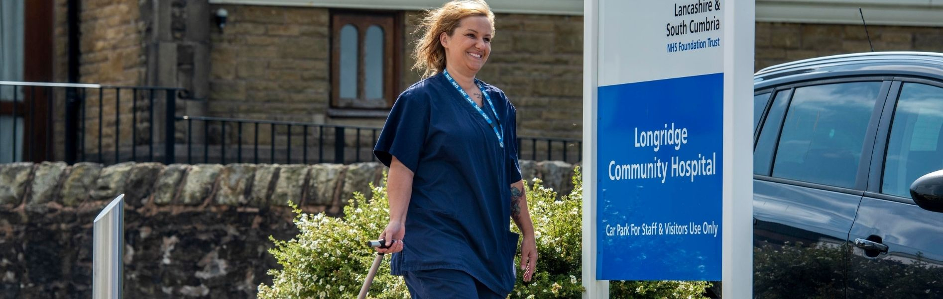 Longridge Hospital staff member walking.png